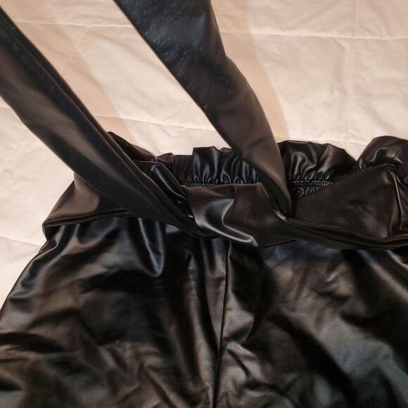 Day and night faux leather leggings. size tag is missing measurements included - Picture 2 of 7